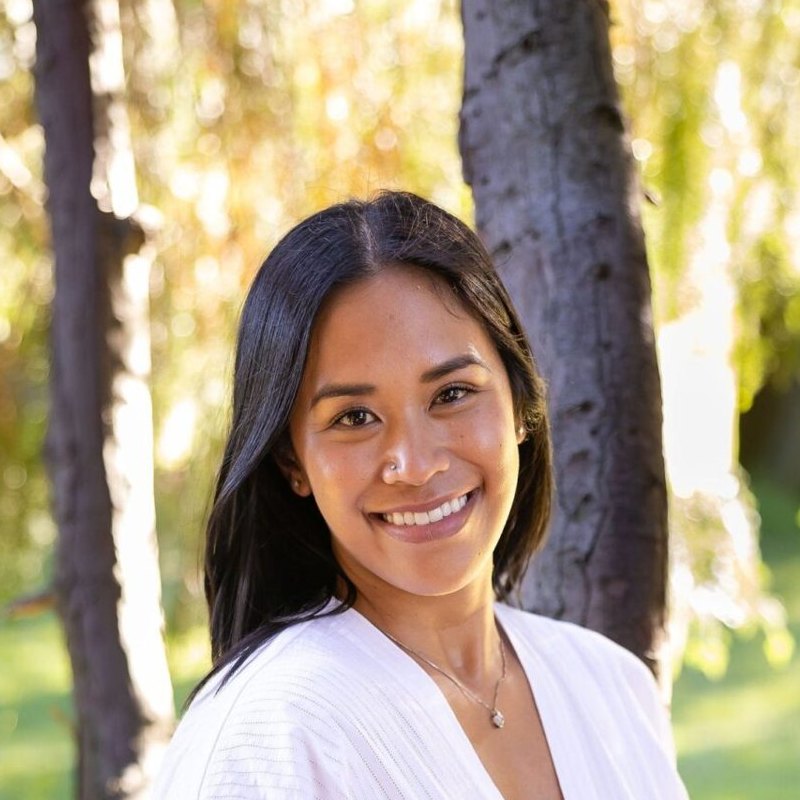 Dr. Monee Dulay smiling outdoors